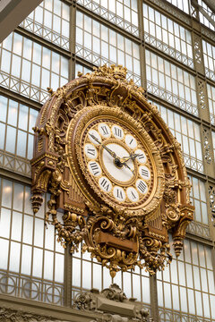 Paris, France, March 28 2017: Golden clock of the museum D'Orsay.The Musee d'Orsay is a museum in Paris, on the left bank of the Seine