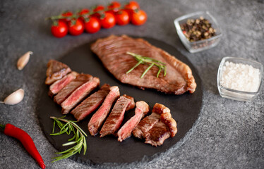 grill Picanha steak on stone background with spices