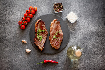 grill Picanha steak on stone background with spices