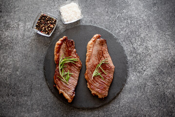 grill Picanha steak on stone background with spices