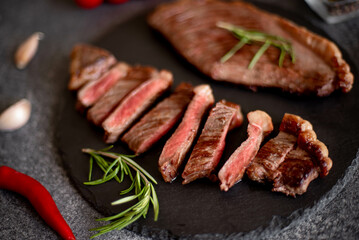 grill Picanha steak on stone background with spices