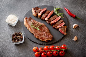 grill Picanha steak on stone background with spices
