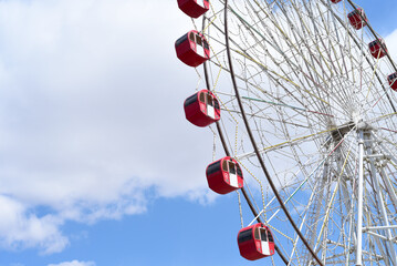 Ferris wheel against blue sky in mongolia.