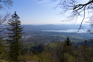 Aerial view over City of Zürich with bay of Lake Zürich on a beautiful spring day with blue cloudy sky background. Photo taken April 21st, 2022, Zurich, Switzerland.