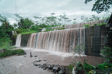 Grojogan watu purbo in sleman, Yogyakarta, Indonesia which has 6 levels of water dam is a popular attraction for tourists