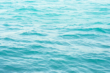 Obraz premium Sea water surface and texture background. Shiny reflects on ripple wave.