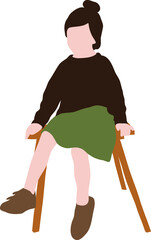 Fototapeta premium A little girl in a green skirt and a brown sweater sits on a chair