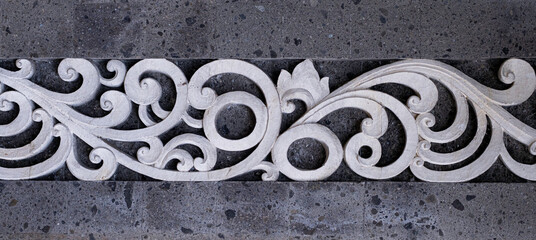 Cement scroll design architectural detail