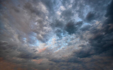 Fototapeta na wymiar dark clouds sky and sun