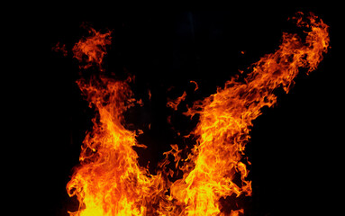 Flames isolated on black background for graphic design or wallpaper.