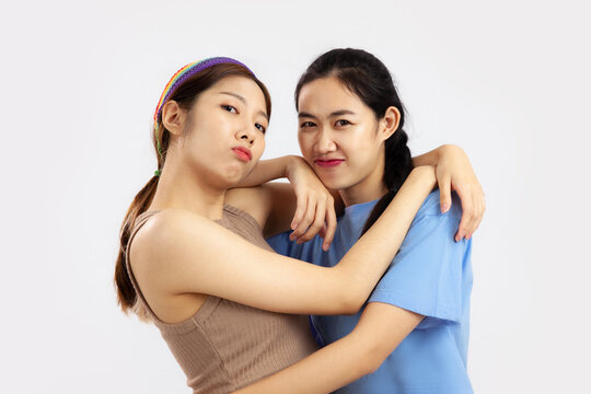 concept of lgbt couple, Two asian women isolated on white background. love pride month 