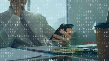 Animation of binary coding data processing over caucasian man using smartphone - Powered by Adobe