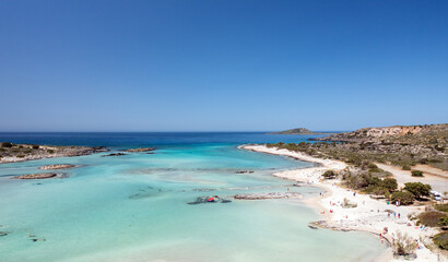 Beautiful coast with azure sea waters, drone view. Elafonisi Beach, Crete
