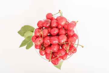 Cherries. Cherry. Cherries in color bowl and kitchen napkin. Red cherry. Fresh cherries. Cherry on white background. healthy food concept.