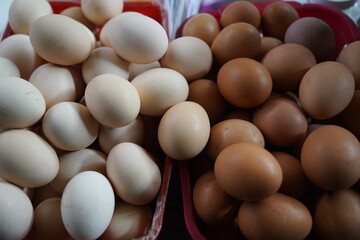 Almaty, Kazakhstan - 03.25.2022 : Chicken eggs are collected for sale in an open market.
