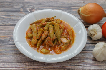 Bamya, Turkish traditional food. (Turkish cuisine) Homemade Food Okra in Plate. Organic Food.