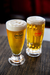 Tap beer in the traditional Japanese ramen restaurant with black table