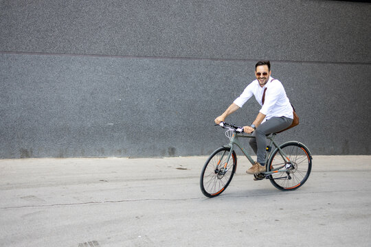 Business man on bike moving photo