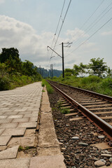 peron railway trees sky supports electric