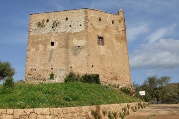 View of the Ulloa tower in the Granada town of Vélez de Benaudalla (Spain) on a sunny spring morning