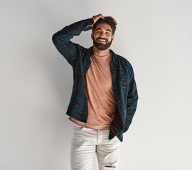 Fototapeta premium Portrait of young handsome man with beard over white background