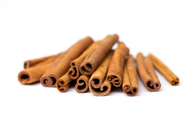 Cinnamon sticks on white background isolated. Indian spices close up. Medicinal herbs and spices.