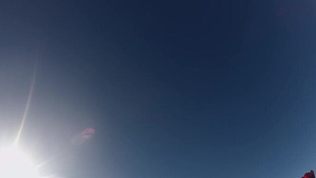skydiving, acrobatics in the sky, a group of parachutists falling next to each other
