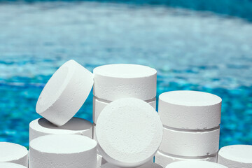 Chlorine tablets for pool maintenance. Chlorine powder or tablets is the most common disinfectant...