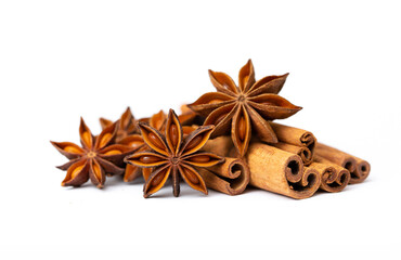 Star anise and cinnamon sticks on a white background isolated. Indian spices close up. Medicinal herbs and spices.