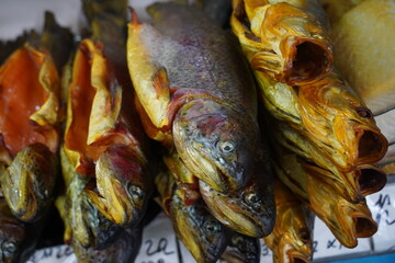 Almaty, Kazakhstan - 03.25.2022 : Selected pieces of fish are put up for sale in an open market.
