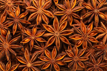 Star anise flat lay as background. Indian spices close up. Medicinal herbs and spices.