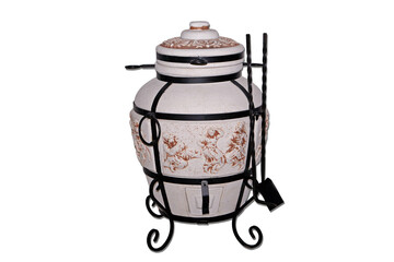 tandoor oven for barbecue and roasting meat made of clay and various drawings with skewers and with a pan with a grill and a cauldron