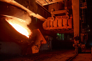 Basic oxygen steelmaking process in a steel mill.