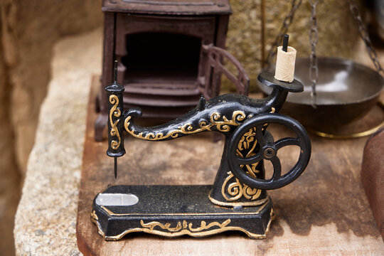 Antiquity. Miniature of an old sewing machine from the 50s or 60s.