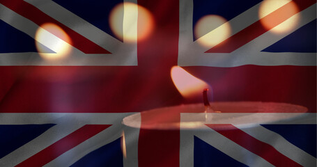 British flag with candle going out