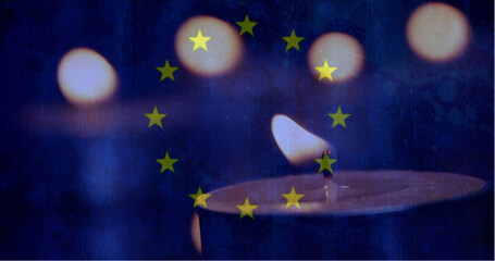 European flag with candle going out