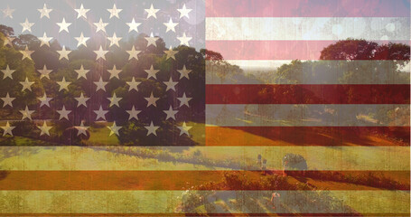 Fototapeta na wymiar American flag against pretty green landscape 