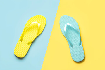 Summer holiday concept.Top view of colored beach flip flops
