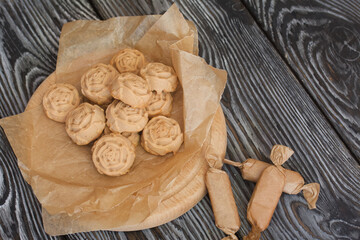 Candy cream toffee. In the form of flowers. Close-up, from above.