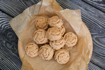 Candy cream toffee. In the form of flowers. Close-up, from above.