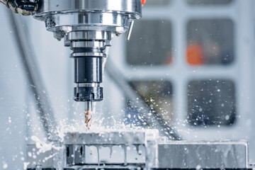 Working closeup CNC turning cutting metal Industry machine iron tools with splash water - obrazy, fototapety, plakaty