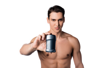 Fototapeta premium brunette man with perfect body holding dry deodorant isolated on white.