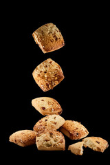 Freshly baked chocolate chips cookies isolated on black background. macro. close up.