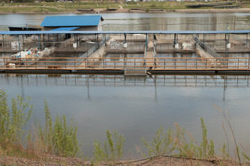 Wide shot of an industrial fish farm