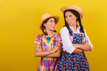 sisters and friends, wearing typical clothes for the Festa Junina. angry, angry, brigades. For the...