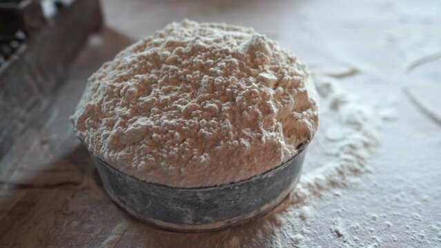 preparing flour to make dough slow motion