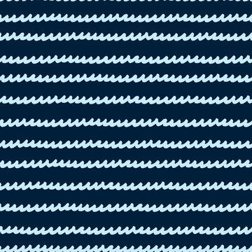 Seamless repeating pattern with hand drawn wavy spiral lines, handwriting imitation, on black background