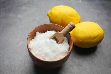 Coarse salt in a bowl on table 