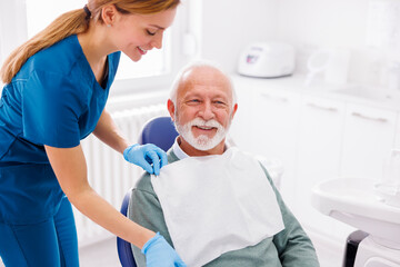 Senior man at dentist office having dental checkup