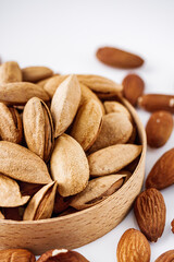 fresh almonds in shell on a white background